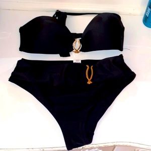 Small black bathing suit with gold detailing